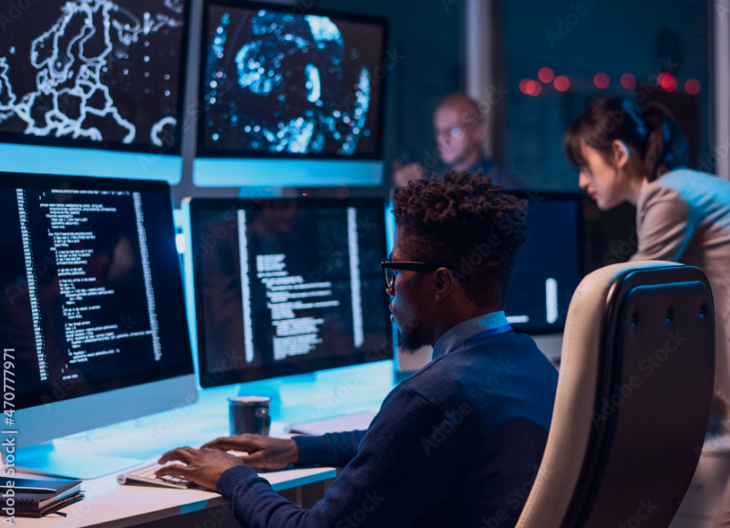 office workers looking at computer screens