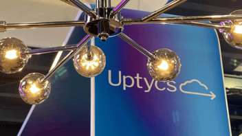 uptycs banner behind chandelier hero image