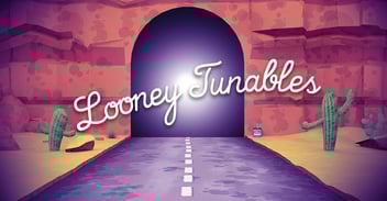 Cartoon tunnel in a desert with banner “Looney Tunables”