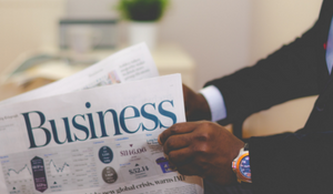 business section of the newspaper hero image