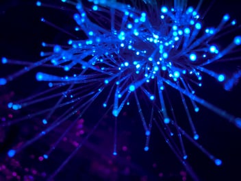 fiberoptic cable bunched ends lit up hero image